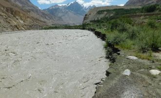 Shimshal River damages bridge, forests, link road at several points Shimshal River damages bridge, forests, link road at several points